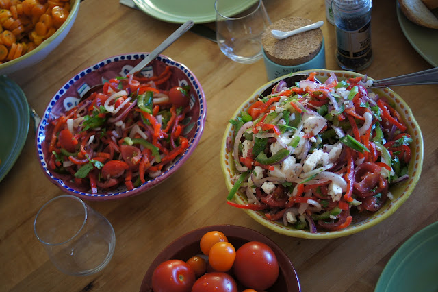 On the left Kosher košer salad  mustalaissalaattia paprikaa sipulia