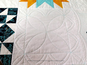 Ruler work around applique crosshatching free motion quilting