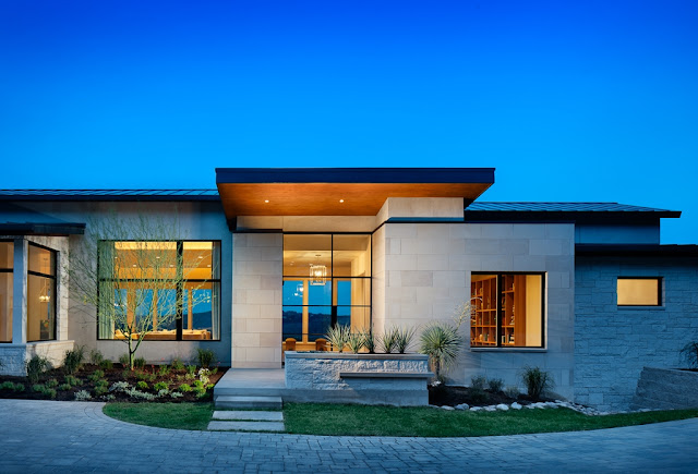 Photo of entrance into the house on the hill at sunset