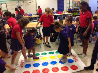 Aleigha and Sophia playing Twister for Dot Day