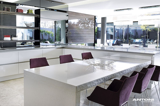 Picture of modern kitchen interiors with purple chairs in the South African dream home
