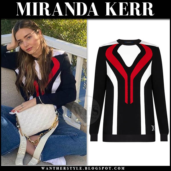 Miranda Kerr in black geometric intarsia sweater and jeans