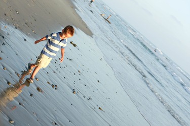 nate walking in the water (1 of 1)