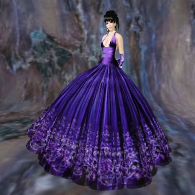 It is an elegant silky gown with lace texture around the hem of a ballroom