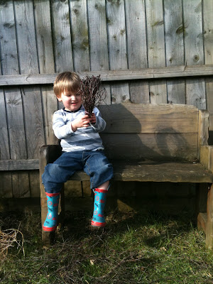 Child on garden bench