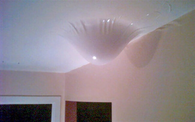The Definition Of Bad Luck In 26 Images - Some water that was running from the roof got stuck in the ceiling's paint.