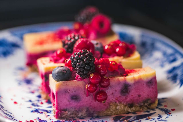 Baked treat with raspberries and blueberries