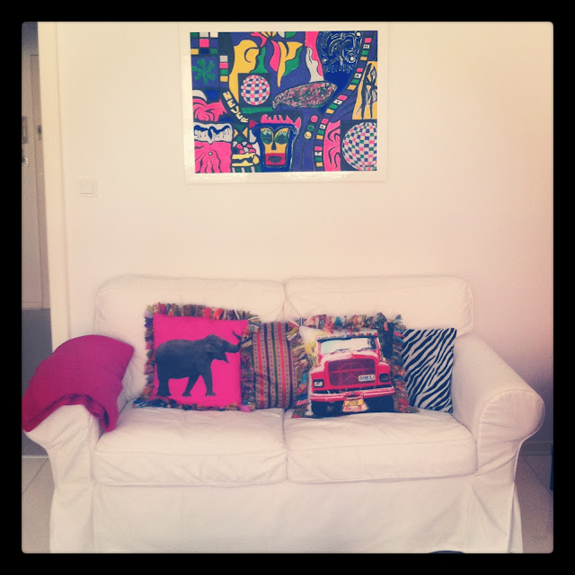 Ikea Sofa, indian cushions, my best painting