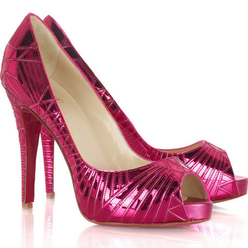 These fuchsia pink mirrored Christian Loubotin shoes are insane