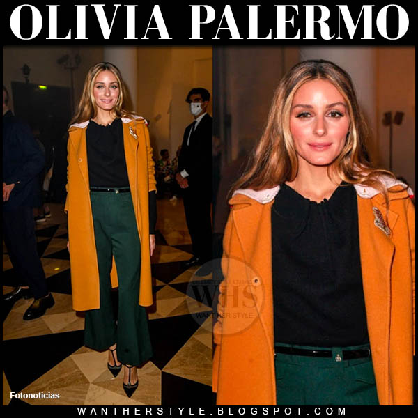Olivia Palermo in orange coat and emerald green trousers