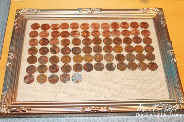Step 4: Arrangement  Now have the kids find the shiniest of the shiny pennies and place it first on the top.   Decide if you want heads or tails to show.   Continue laying out the pennies in the order of shiny to dark to teal.
