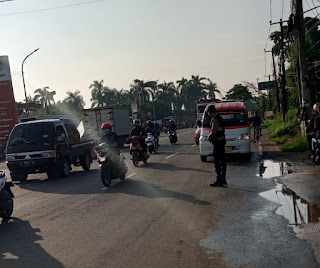 Personel Satsamapta Polres Serang Laksanakan Turjawali di Jalan Arteri Serang Tangerang