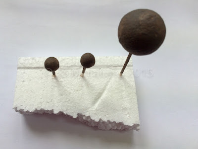 Polystyrene balls painted brown