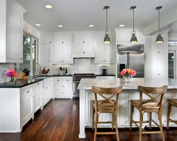 beautiful white kitchen cabinets with black countertops