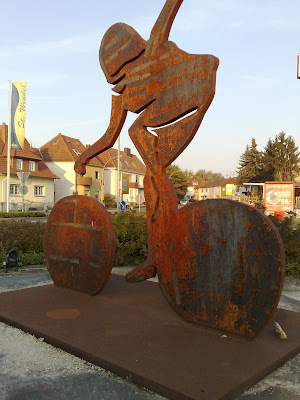 cyclist, roundabout, rust