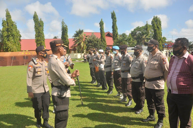 Untung Sangaji Pimpin Upacara Pergeseran Anggotanya ke 20 Distrik di Merauke