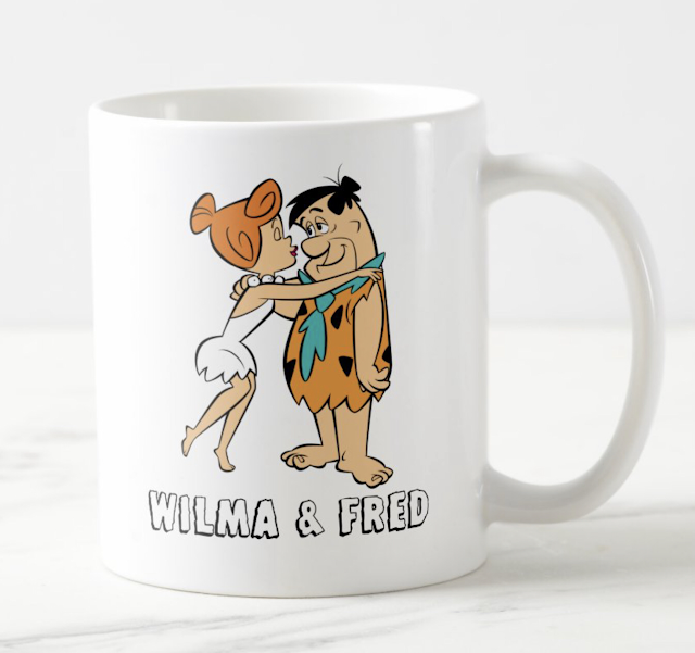 The Flintstones coffee mug with Wilma and Fred Flintstone.