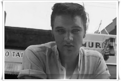 Young Elvis Presley in black and white