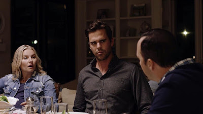 Elisha Cuthbert and David Walton have dinner with Tony Hale in a movie still for the film "Eat Wheaties!"