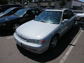 Honda Accord after overall paint job with color change and headlamp restoration.