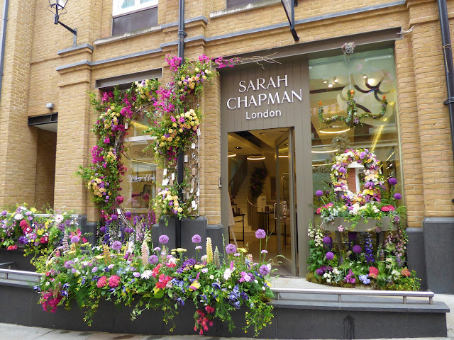 Floral arches on King's Road, London, for Chelsea in Bloom 2018 free flower festival