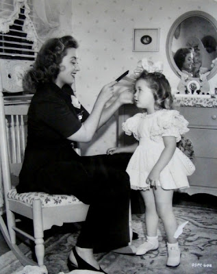 Here is a nice photo of actress Joan Blondell and her daughter Ellen circa 