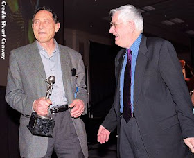 Mack, a year before his death, with Budd Hopkins, the American artist and abduction researcher, at the International U.F.O. Congress Awards in 2003 