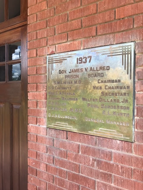 1937 Plaque Restored to Former Prison Building