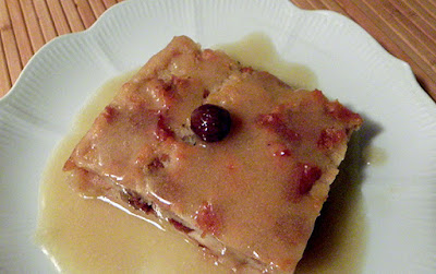 Square of Bread Pudding topped with Bourbon Sauce