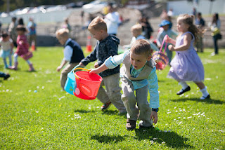 Photo of children participating in an Easter egg hunt
