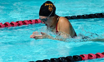 Image of a woman doing breaststroke. Breaststroke: Breathing Problems is Your Head Too Deep