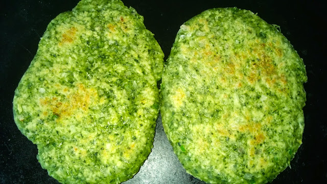 Moringa flat bread is being cooked on a griddle