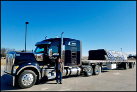 Keim TS driver Ralph Cowan with his Kenworth W990