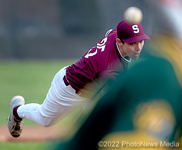 Caleb Ochs unloads a pitch for St. Joseph-Ogden