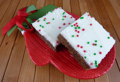 Photo of GIngerbread Bars, sitting on a mitten-shaped plate