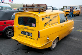 Trotters independent traders yellow three wheeler 