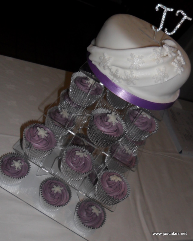 Purple Snowflake Cupcakes Perfect for a winter wedding or celebration 