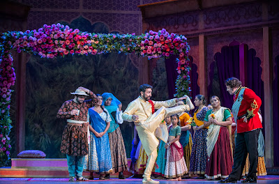 Figaro (Efraín Solís) kicks up his heels to Count Almaviva (Eugene Brancoveanu) in Opera San Jose’s vibrant new production of Mozart’s “The Marriage of Figaro” set in India.