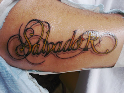 salvador text tattoo