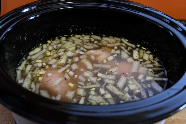All of the soup ingredients in the crock pot.