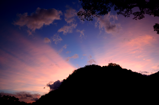 sunrise rays over mountain