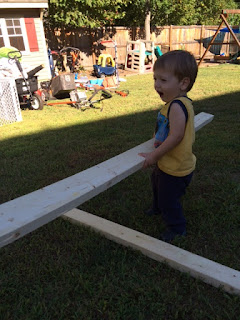 How to build shed shelving: my son helping. #woodworking #storage #organization