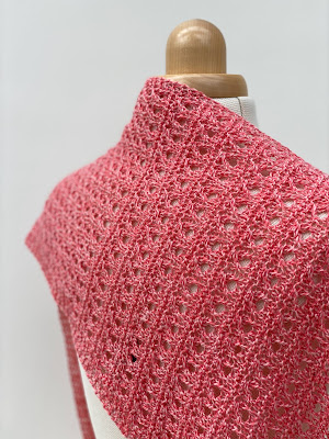 Detail of hand knitted shawl showing stitch pattern