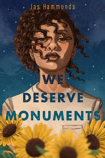 The torso of a young Black woman with curly hair shaved on one side is framed by sunflowers on the bottom and a starry night sky around her head