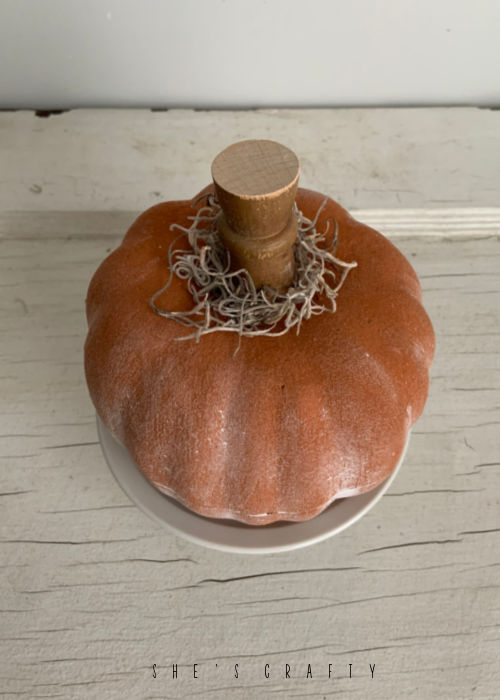 Faux terra cotta pumpkins.