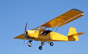 An Afternoon Flight with two Ultralight Aircraft (trike in flight)