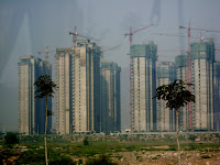 Cranes and buildings loom in the developing region