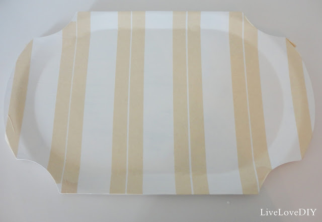  I came across a apparently woods tray for a dollar DIY Striped Wooden Tray Makeover