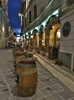 Wine barrels line the streets to decorate the streets at Christmas time in Montefalco Umbria Italy