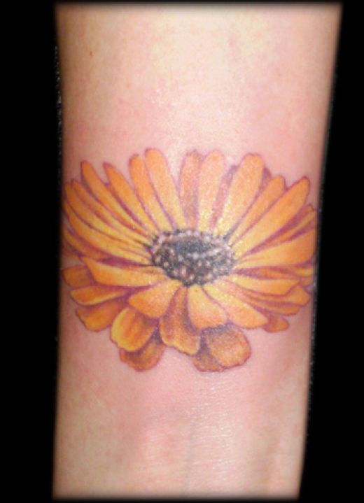 Hawaiian Flower Tattoo On Foot. hawaiian flower tattoos black